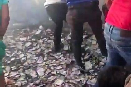 Armed gang storms Colombian airport in Hollywood-style heist - 24 bags of cash stolen as suspects shoot, flee across runway, burn van and scatter notes in daring escape.