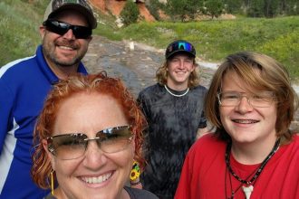 A Nebraska family-of-four was found dead in a suspected murder-suicide, with Jeremy Koch believed to have fatally stabbed his wife and two sons before taking his own life.
