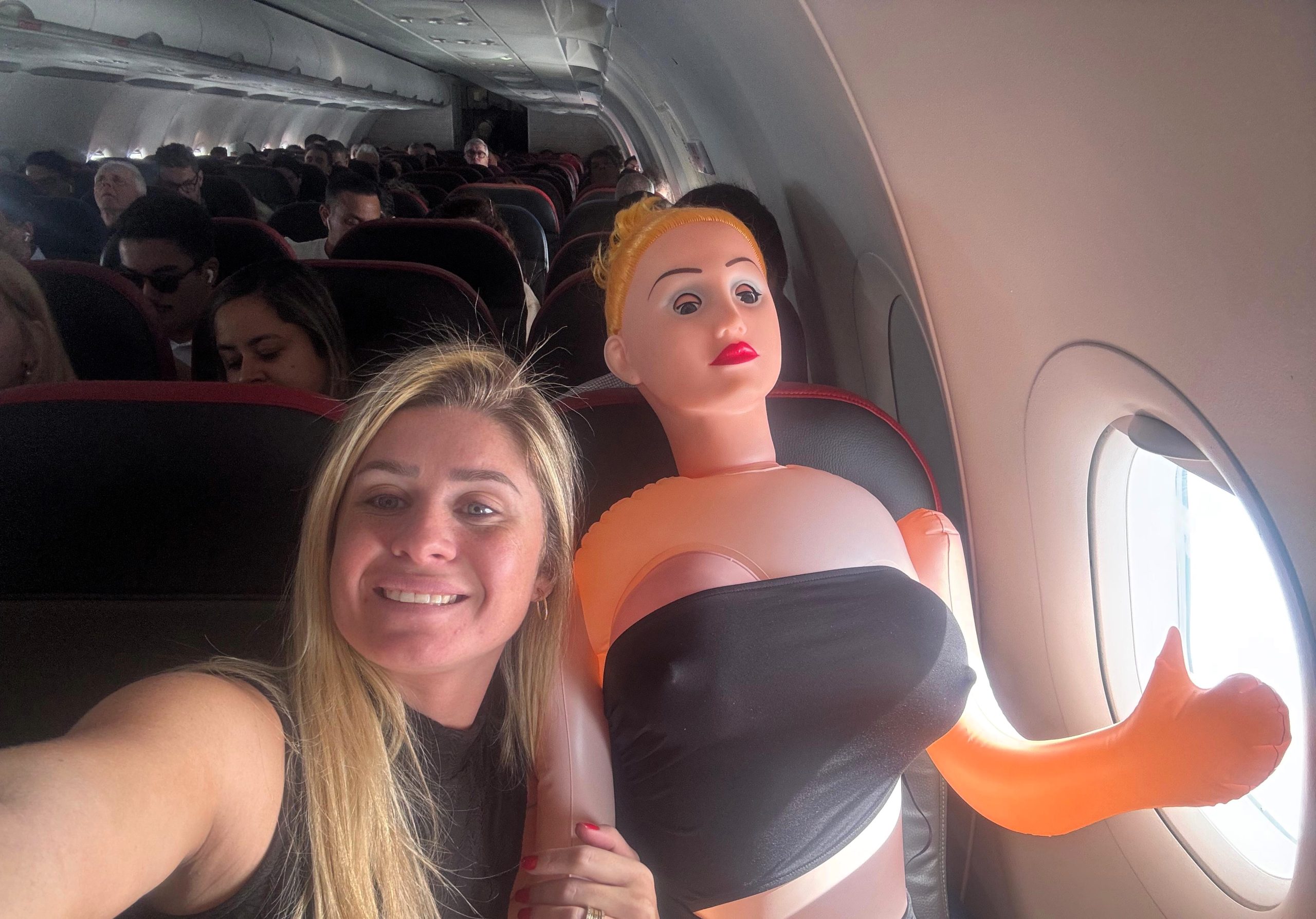 Female influencer boards flight with blow-up sex doll in tow | Need To Know Female influencer boards flight with blow-up sex doll in tow | Need To Know