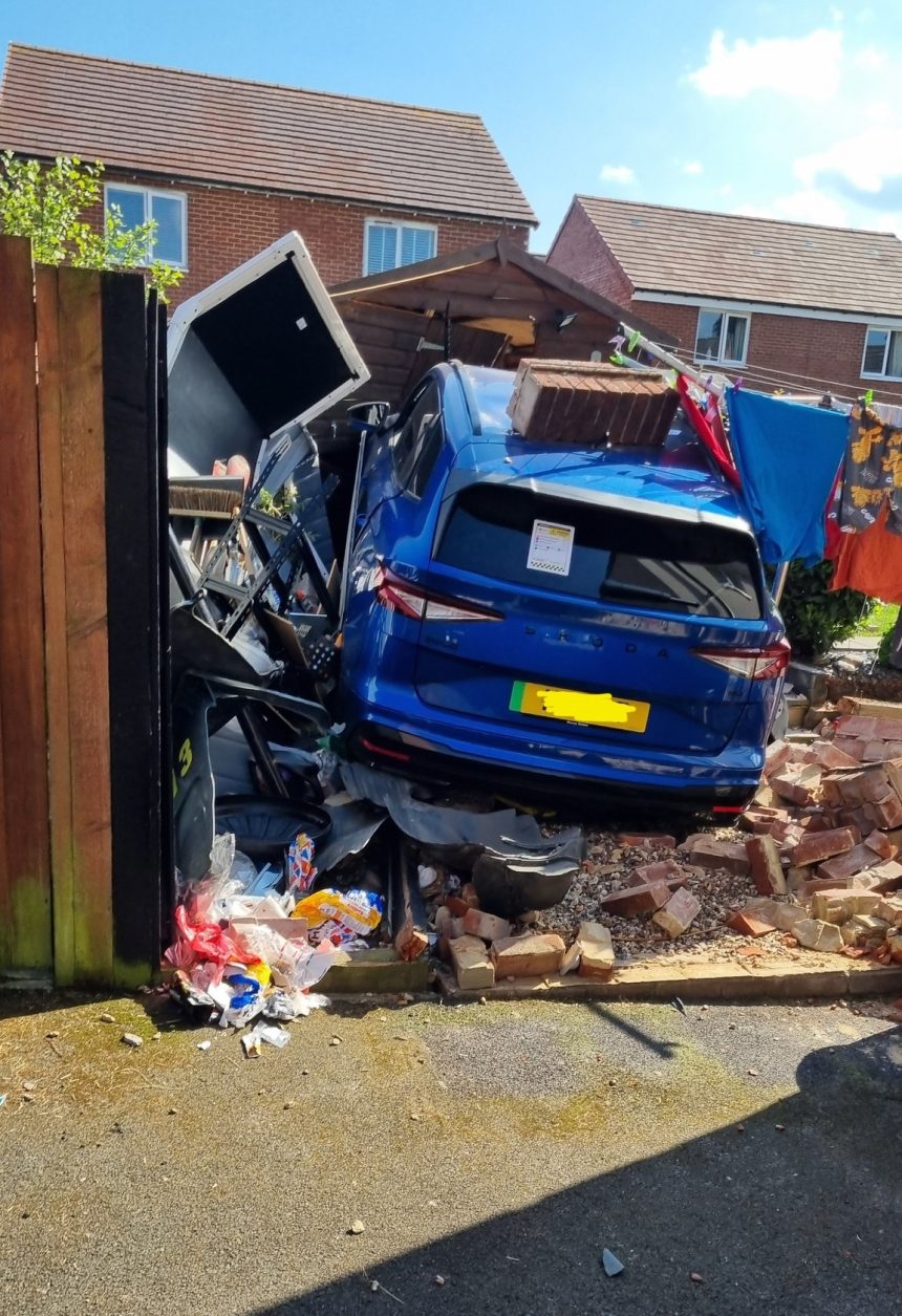 Hapless driver smashes electric car into shed after ploughing through ...