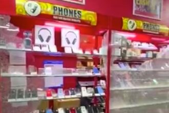 A masked thief raided a CEX store in Wembley, stealing £15,000 worth of tech including iPhones and iPads after smashing display cabinets in a broad daylight heist.