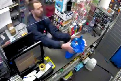 A thief stole a bag of booze from a counter in Bromley-by-Bow as a shop assistant turned her back, escaping in front of shocked customers while she gave chase.