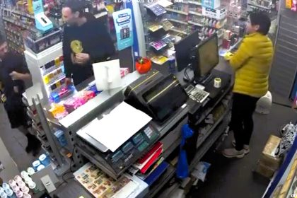 Two thieves stole booze in front of a shop worker in Bromley-by-Bow - one distracted her with chat while the other looted the fridge before both casually walked out.