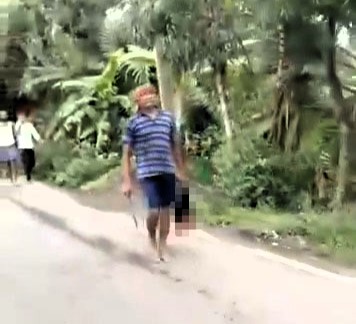 A man in India is accused of beheading his sister-in-law during a family dispute, then parading her severed head through town before being arrested by police.