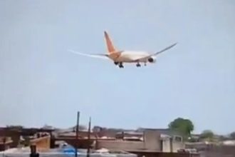 Air India flight AI171 crashed shortly after takeoff from Ahmedabad, leaving debris on rooftops and smoke over Meghani Nagar. Emergency crews are responding to the tragedy.