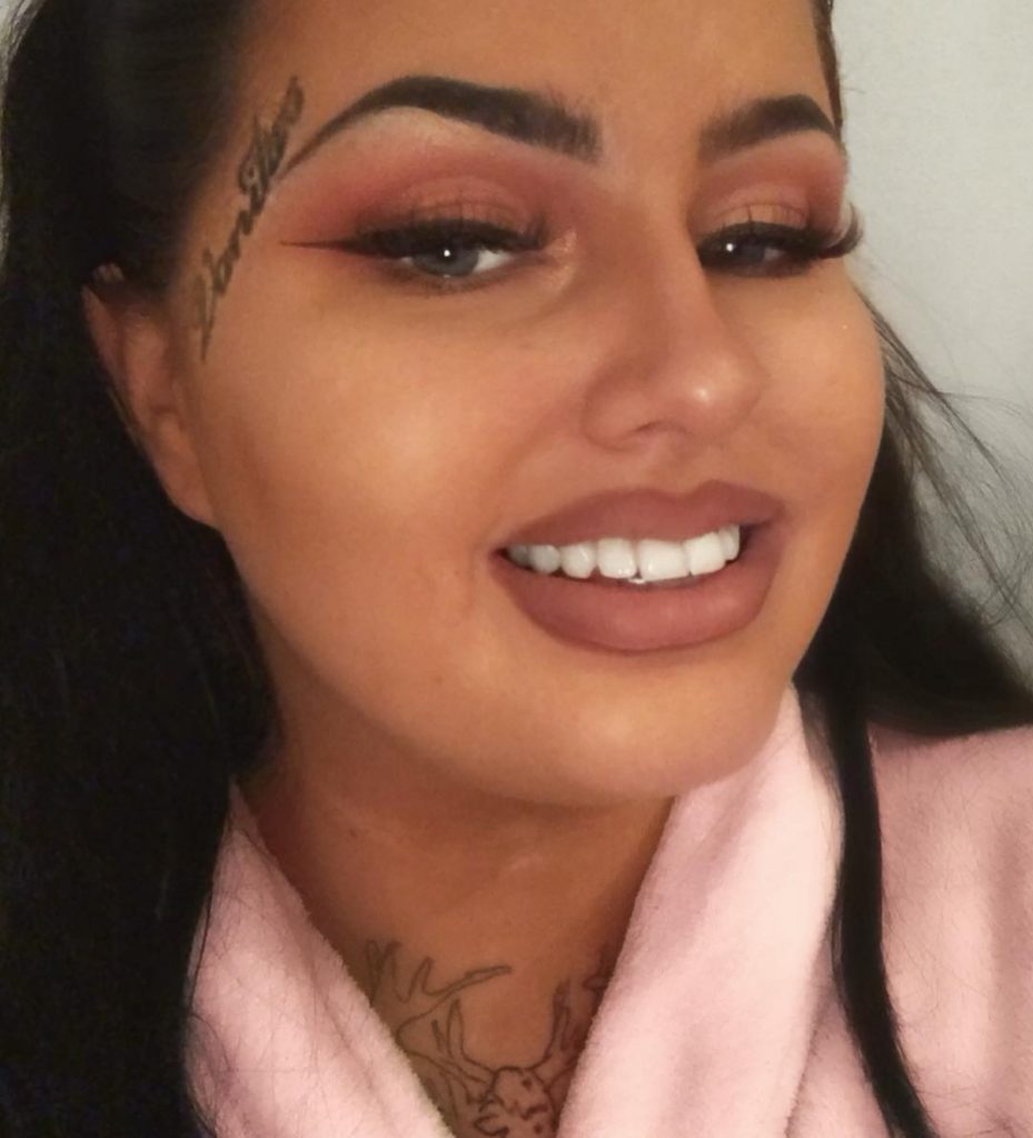 Tattooed woman with tan and big lips hits back at critics - says her bold look helps her stay sober and happy after addiction battle and she’s not done yet.