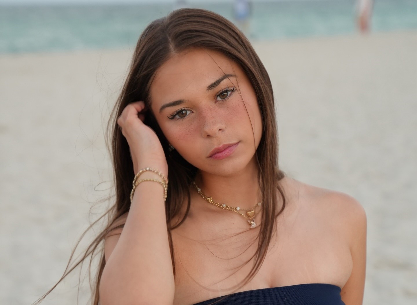 OnlyFans star Sophie Rain boasts $76m earnings while shading Bonnie Blue’s 1,000-men stunt, sparking debate over morality, marketing, and double standards in adult content.