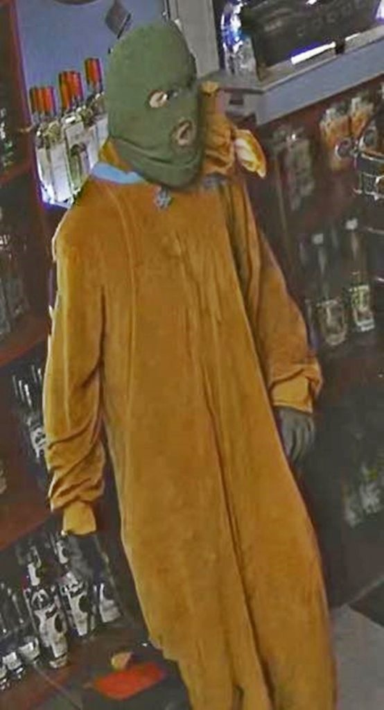 Scooby-Doo-costumed thief wanted after Alabama store raid - suspect stole cash but no snacks as police share images and appeal for help to unmask the mystery crook.