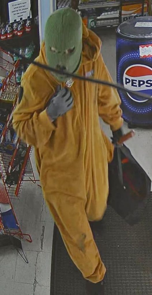 Scooby-Doo-costumed thief wanted after Alabama store raid - suspect stole cash but no snacks as police share images and appeal for help to unmask the mystery crook.