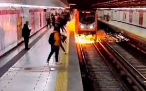 Umbrella causes fiery explosion on Mexico City Metro tracks after short-circuit sparks panic - no injuries reported as trains resume after swift emergency response.