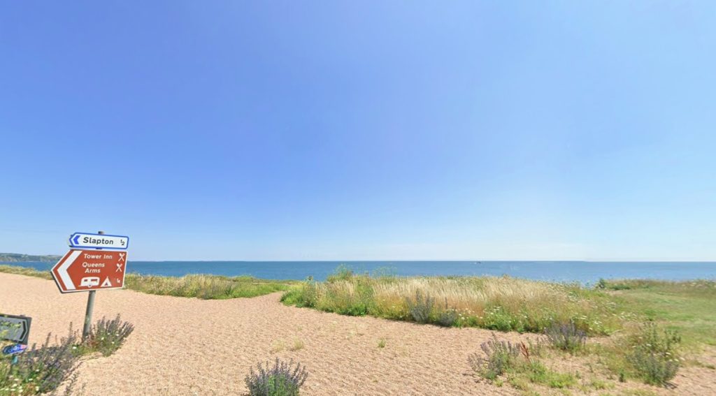 A bomb was safely detonated by the Royal Navy at Slapton Sands, Devon, stunning beachgoers as white smoke and debris filled the air during the dramatic operation.
