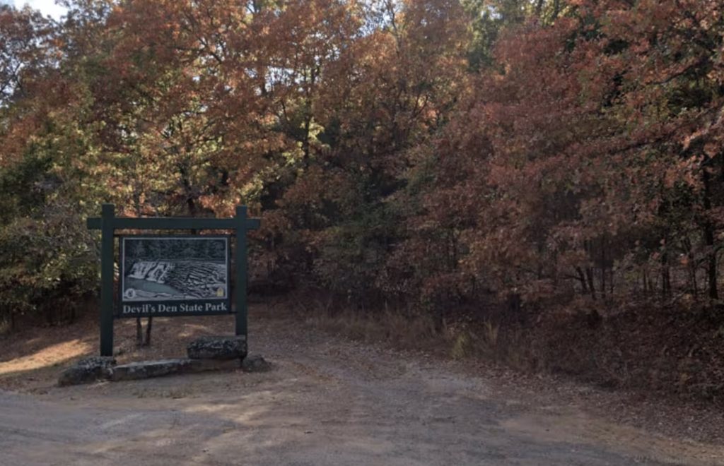 Couple killed on Devil’s Den trail identified as Clinton and Cristen Brink as Arkansas police release suspect details and urge public to check footage from 26 July.