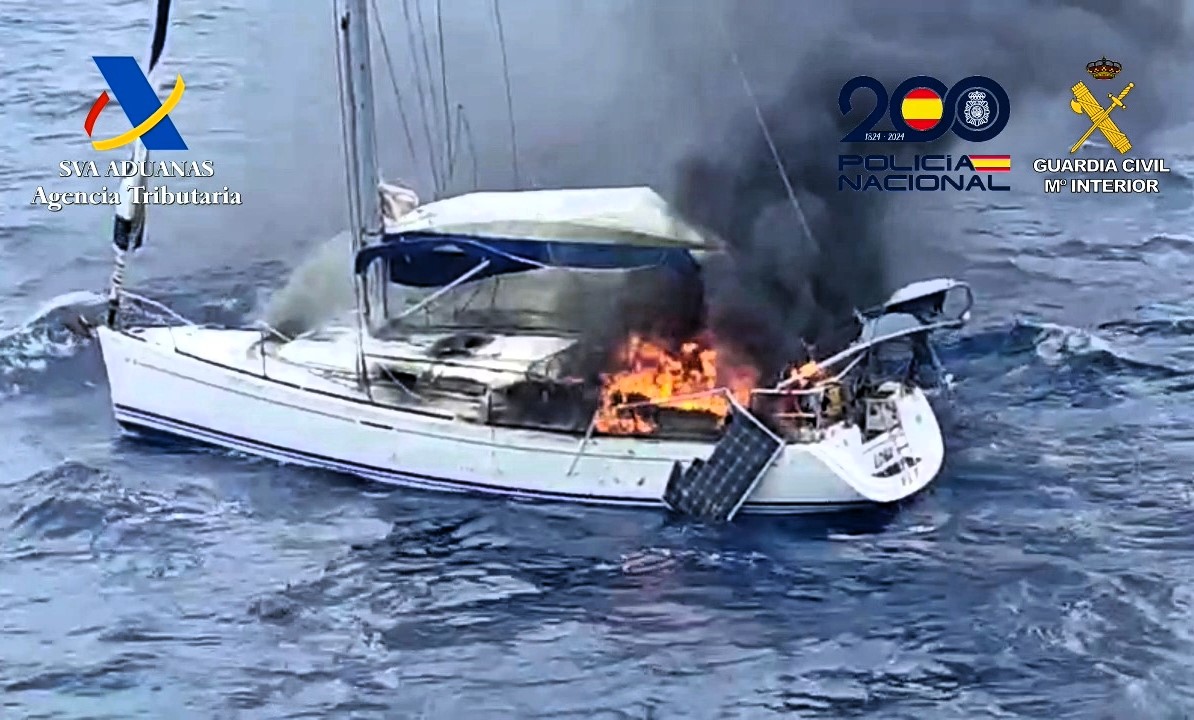 Two smugglers set their cocaine-filled yacht ablaze off Tenerife after a sea chase - Spanish officials rescued them, recovered 25kg of drugs, and made arrests with UK and US help.
