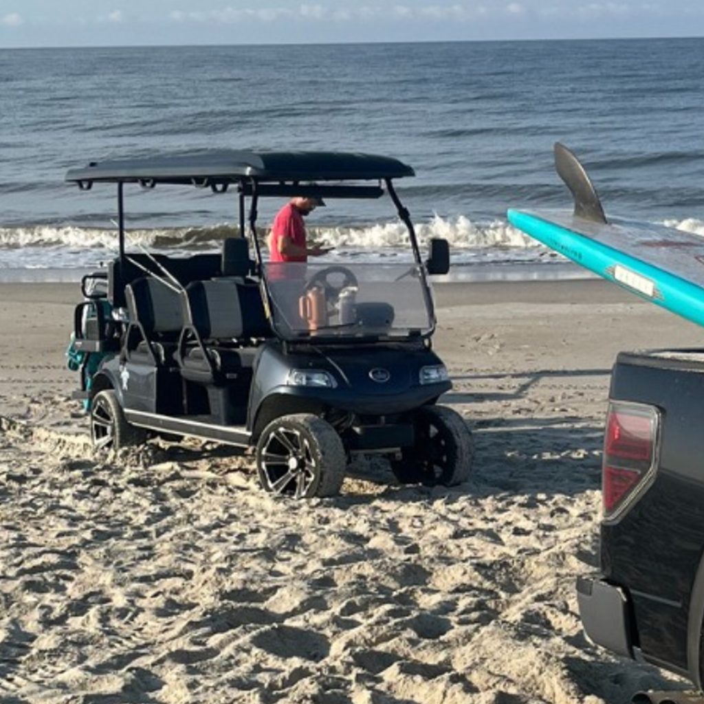 Cars got stuck in sand after driving on Oak Island beach, damaging a vital wheelchair access mat. Officials are assessing costs and drivers face multiple citations.