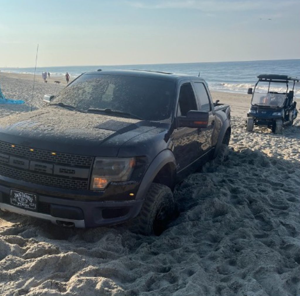 Cars got stuck in sand after driving on Oak Island beach, damaging a vital wheelchair access mat. Officials are assessing costs and drivers face multiple citations.