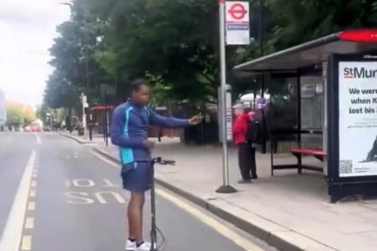 E-scooter rider crashes into lamppost while riding hands-free in Hackney - viral clip sparks mix of laughs and concern as nearby ambulance is spotted.