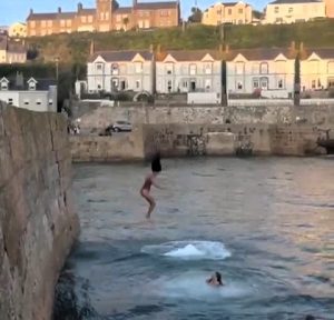 Lionesses make history with Euros win over Spain as fans leap off cliffs in joy in Porthleven after dramatic 3-1 penalty shootout victory secures second major trophy.
