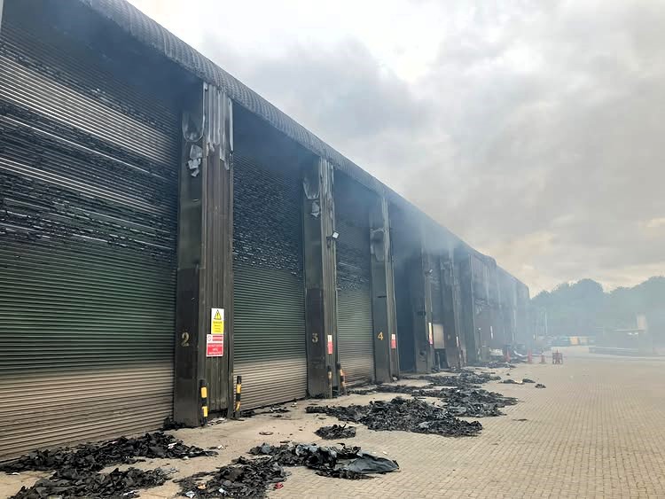 Elstow Waste Transfer Site blaze triggers controlled burn strategy - roads closed, green bin collections halted and locals told to keep windows shut for safety.