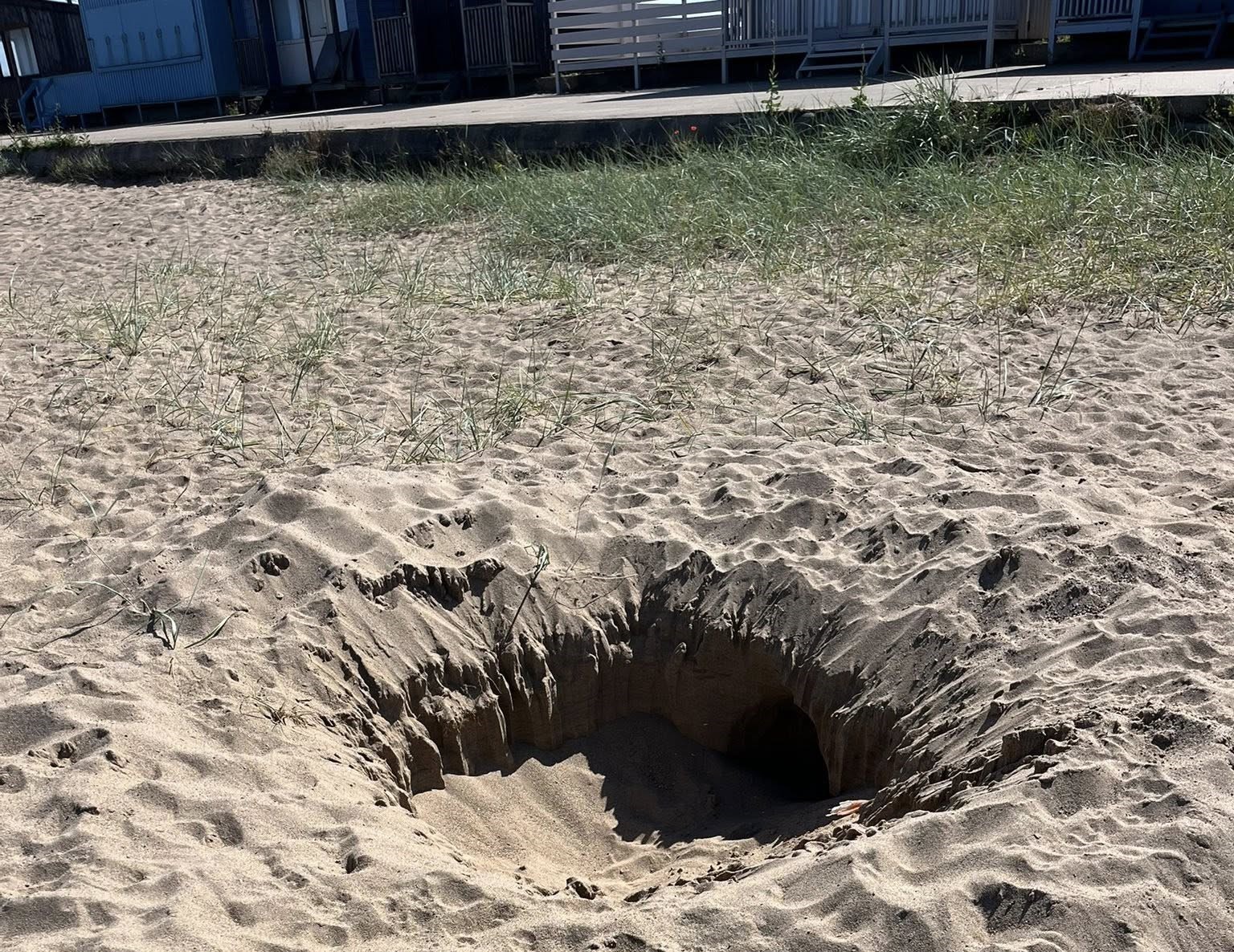Coastguards urge beachgoers to stop digging deep holes after a 6ft pit was found in Lincolnshire, warning of entrapment and injury risks. Officials filled it in for safety.