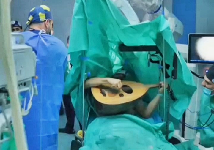 While undergoing brain surgery, Mohammed Sarbest Zakhoyi played a lute-like oud to help surgeons monitor vital brain functions, aiding in the successful removal of a tumor.