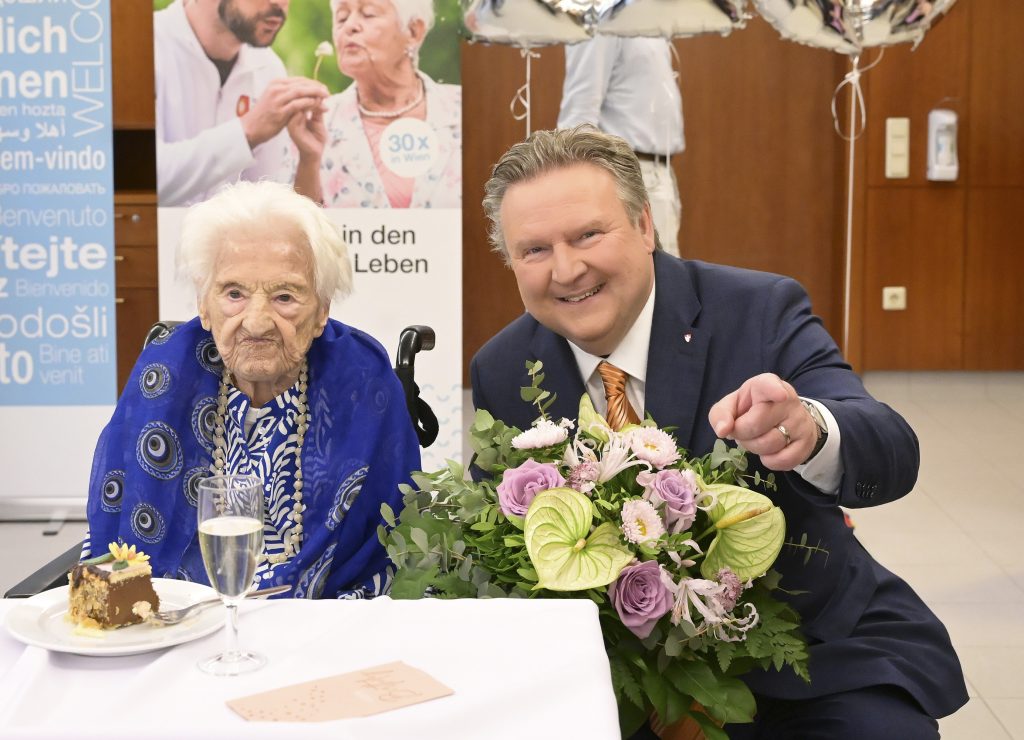 Sweet-toothed Emma Wenda celebrated her 110th birthday with a rum-soaked cake, marking a life spanning two world wars, a helicopter ride at 95 and new teeth at 103.