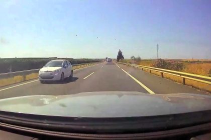 Woman under investigation for driving over five miles wrong way on Spanish motorway near Algarve as dashcam shows drivers swerving to avoid head-on collisions.
