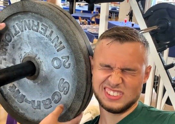 Wrestler Marcus Borger, 21, drops weights on his ears to get cauliflower ear - inspired by his Olympic grandad and driven by his belief that the look is cool.