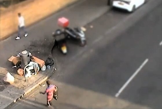 Fly-tipper caught on CCTV dumping rubbish by bin in Southall - Ealing Council launches investigation and urges public to help name and shame offender.