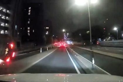 Car flips onto its side on A13 Canning Town flyover in crash likened to GTA - sparks fly as it skids across road - medics rush driver to hospital after shocking scene.