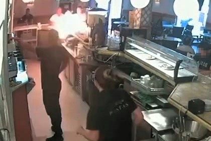 Man torches Seville café after being refused mayonnaise - pours petrol on counter and sets it alight as diners flee - arrested minutes later with burns to his arm.