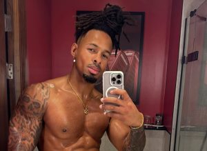 Love Island star Konnor Ewudzi, aka Woodzy, is back to barbering at a Cornwall shop just a year after the show. Fans praise his return to his roots and hardworking spirit.