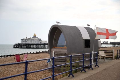 Eastbourne festooned with St George’s and Union Jack flags in national ‘Raise the flag’ protest - quiet seaside town covered in banners sparking mixed local reaction.