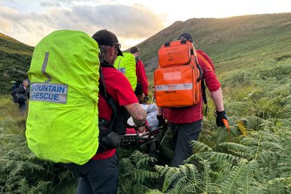 Rescuers trekked miles through rugged Dartmoor terrain to save an injured walker in Tavy Cleave, stretcher-carrying him for hours before handing him to paramedics.