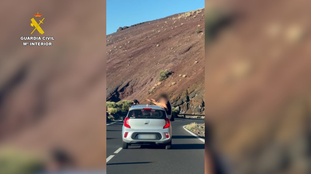 Eight tourists fined in Tenerife after being filmed hanging out of moving cars in Teide National Park - drivers hit with €500 penalties as police crack down on reckless acts.