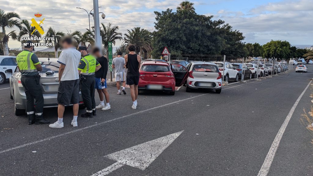 Eight tourists fined in Tenerife after being filmed hanging out of moving cars in Teide National Park - drivers hit with €500 penalties as police crack down on reckless acts.