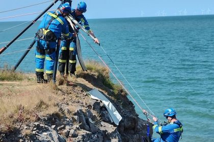 Two teens trapped by the rising tide on a cliff in Bude, Cornwall were dramatically rescued at night, with one hauled by ropes and the other winched to safety by helicopter.