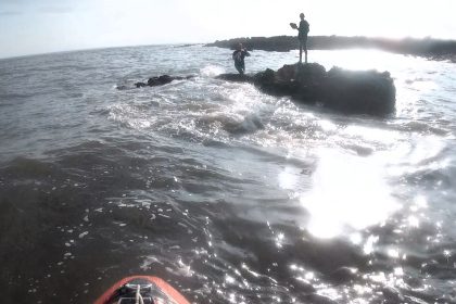 Two teenagers stranded on rocks near Newton Point Porthcawl were rescued by RNLI after a rapid tide rise with crews urging beachgoers to check tide times for safety.