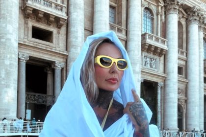 A woman says she was humiliated after Vatican guards made her wear a sheet to cover up her playsuit, claiming it was prejudice despite others wearing similar outfits.