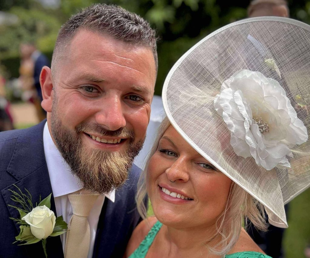 Hero dad Chris Topps jumped from his car to help a lone cop wrestling a suspect outside a police station in Torquay - pinning him down until backup arrived.