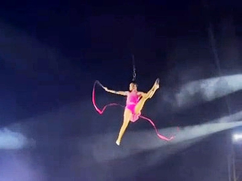 Circus acrobat plunges during hair hanging act in Brazil - Aliane Dias rushed to hospital after shocking fall but thankfully survives and is now recovering well.