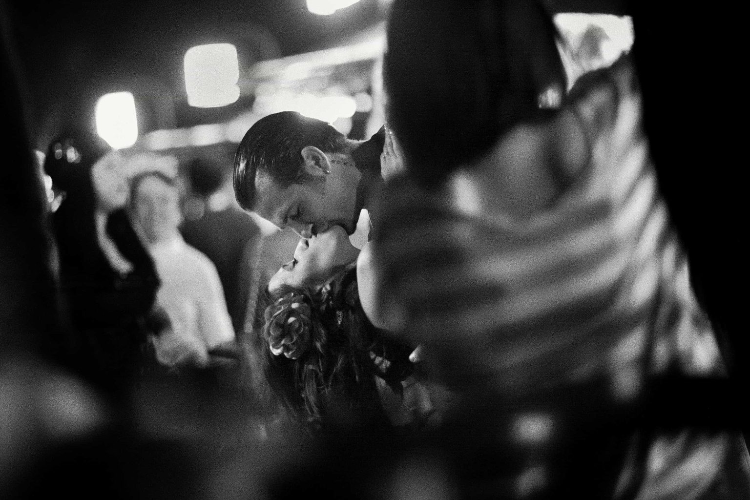 Street photography competition showcases striking moments from around the world including a Times Square kiss, Houhai lake swimmers, urban life scenes and global artistry.