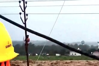 Horror floods in Uttarakhand as a river bank bursts in Dehradun - 13 dead, 16 missing and dramatic rescue of a man clinging to an electric pole for survival.