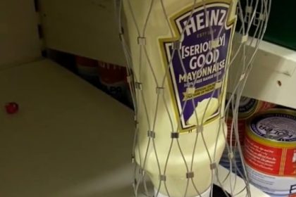 Tesco shocks shoppers by putting security tags on £3.60 Heinz mayo and olive oil as inflation drives everyday items onto high-risk theft lists alongside cheese and ham.