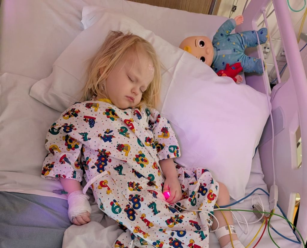 A mum is calling for more brain tumour research after her daughter Molly, 3, endured multiple surgeries and trials but now faces lifelong challenges and uncertainty.
