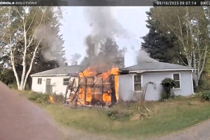 Hero firefighters rescue 76-year-old pensioner from blazing Michigan house fire - dramatic video shows smoke-filled mission as man suffers burns and critical injuries.