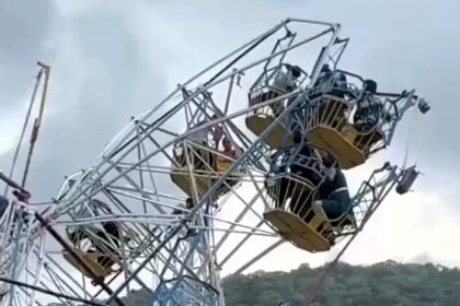 Terrified passengers screamed as a ferris wheel tipped sideways at a fair in Madhya Pradesh after a hook snapped - all were rescued safely as police vowed safety checks.