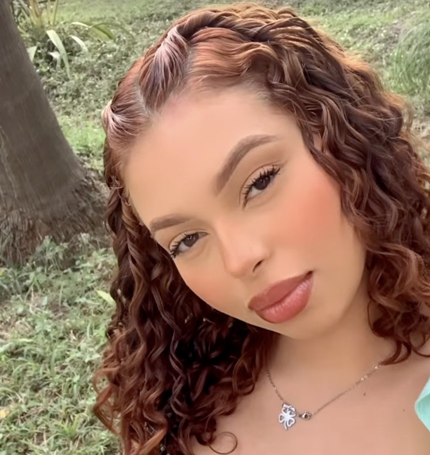 A Brazilian gang member dubbed Crime Muse who flaunted weapons online has been shot dead in the face during a massive police raid that left over 120 people dead in Rio.