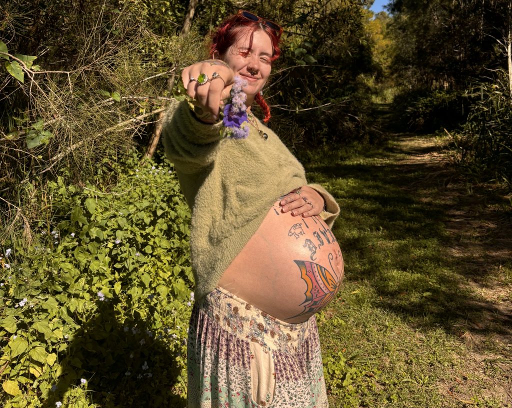 Mum with 60 tattoos faces cruel stares on school runs but embraces self expression and positivity while raising her kids to value authenticity and celebrate differences.