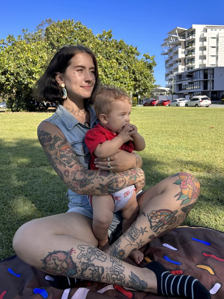 Mum with 60 tattoos faces cruel stares on school runs but embraces self expression and positivity while raising her kids to value authenticity and celebrate differences.