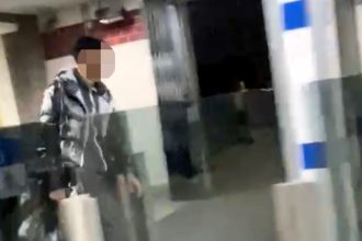 A man in a £1,700 Moncler jacket was filmed skipping Tube barriers before heading to a taxpayer-funded migrant hotel in Wembley, sparking outrage among locals.